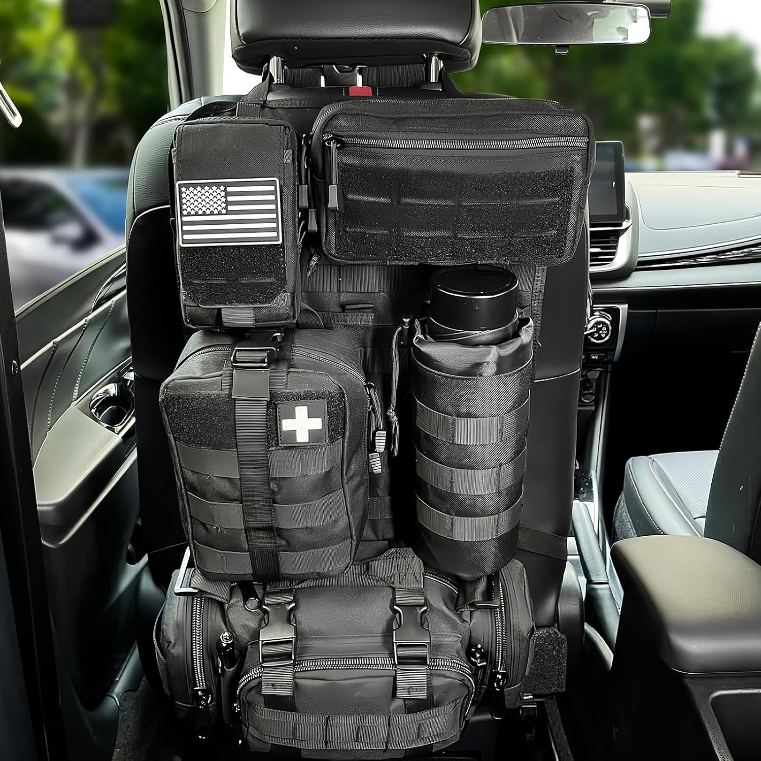 81gbilde9tL._AC_SL1500_.jpg Universal Tactical Vehicle Seat-Back Organizer With Five Black Pouches - Image 1